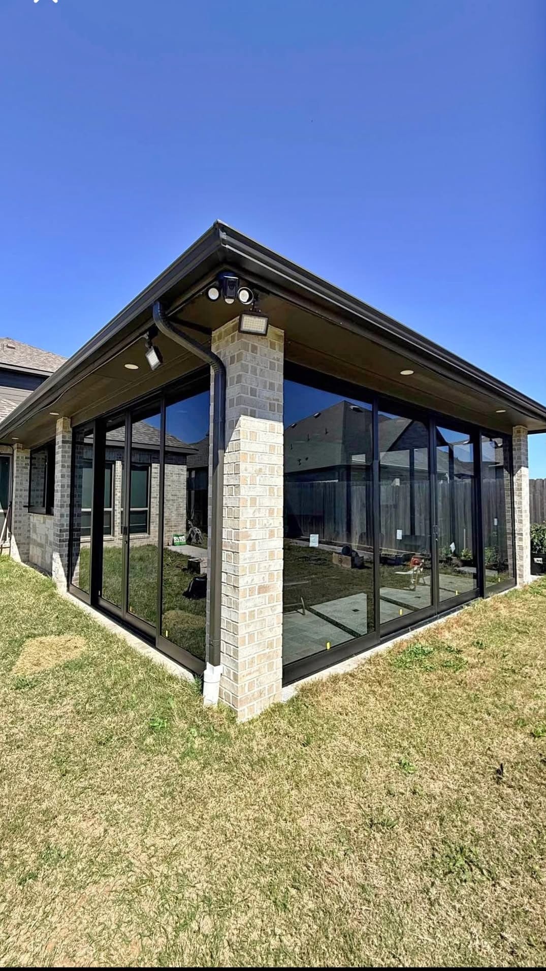 Patio glass enclosure by Racso Glass LLC