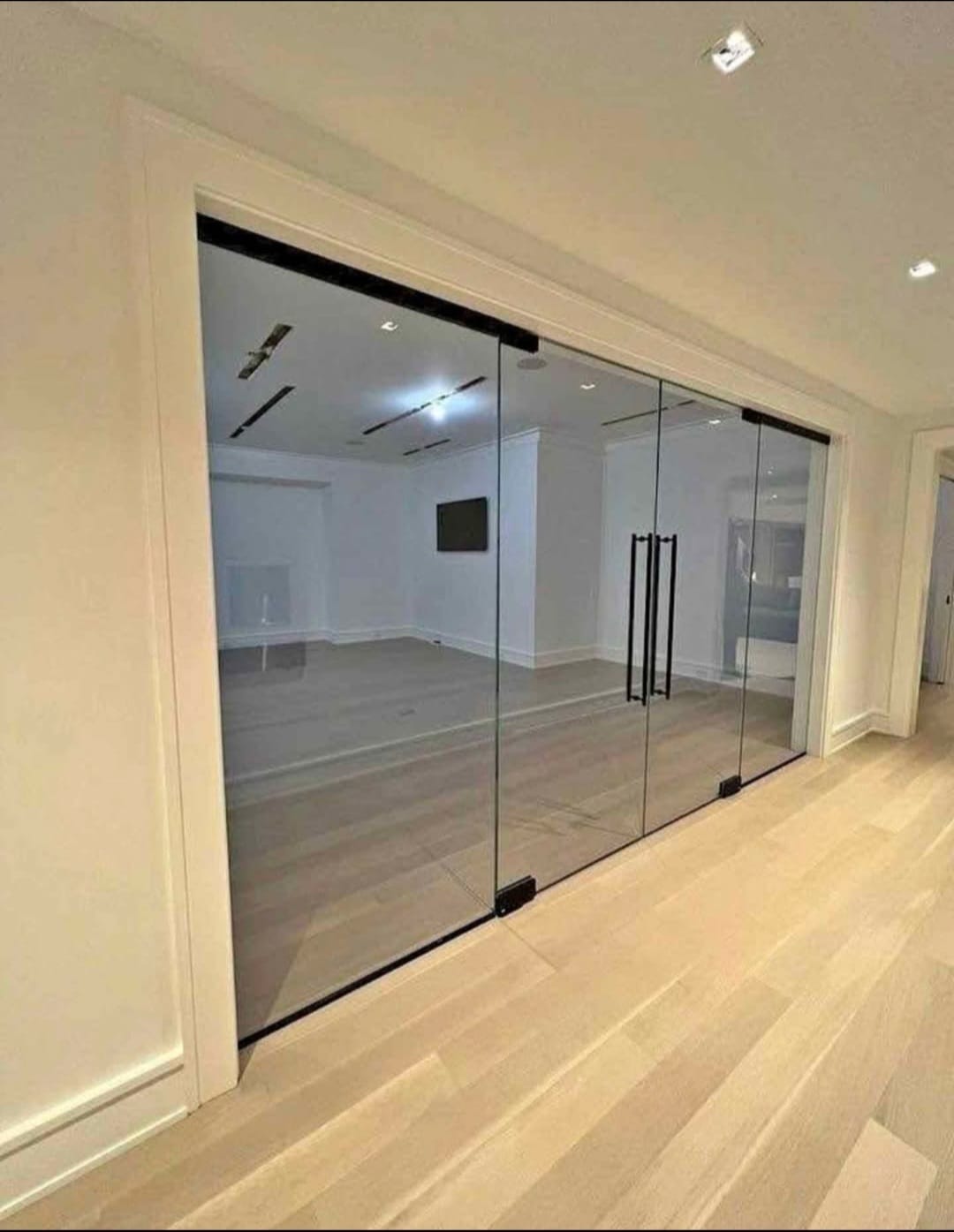 Interior glass double doors by Racso Glass LLC
